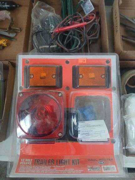 Box of misc electric/ trailer light kit. image