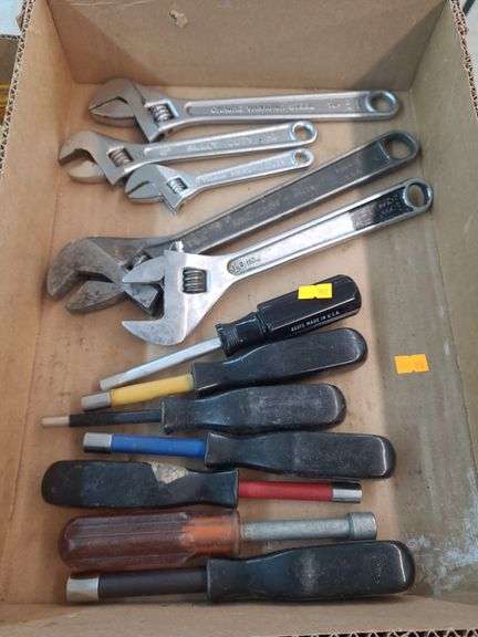 7 nut drivers and 5 various sized crescent wrenches image