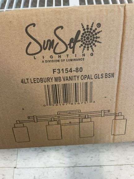 Four light vanity light fixture. New in box image