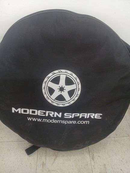 Modernspare, Spare tire with tire bag. image