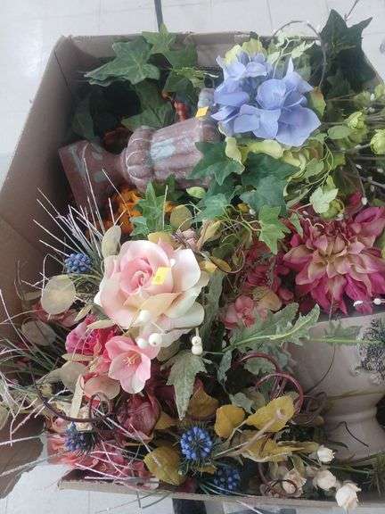 Box of artificial plats. image