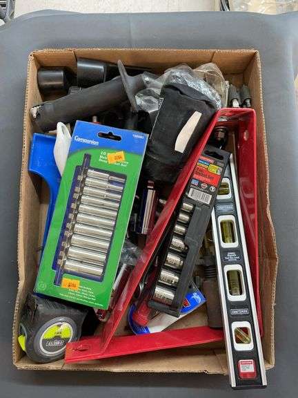 Box of various tools and hardware. image