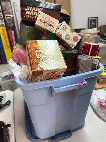 Tote full of assorted empty decorative boxes image