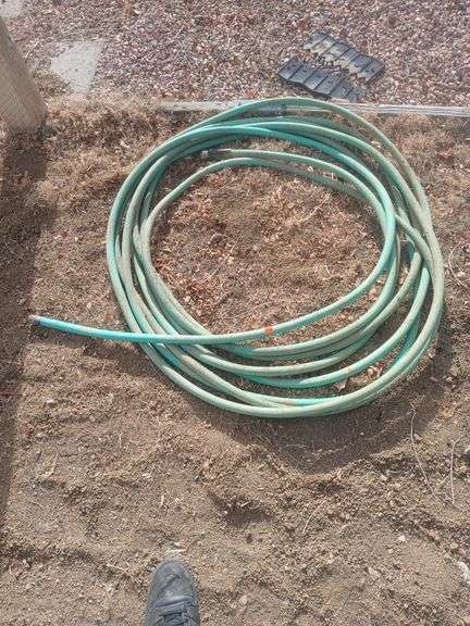 Blue garden hose image