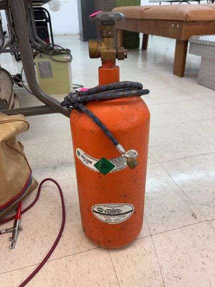 Orange high-pressure cylinder image