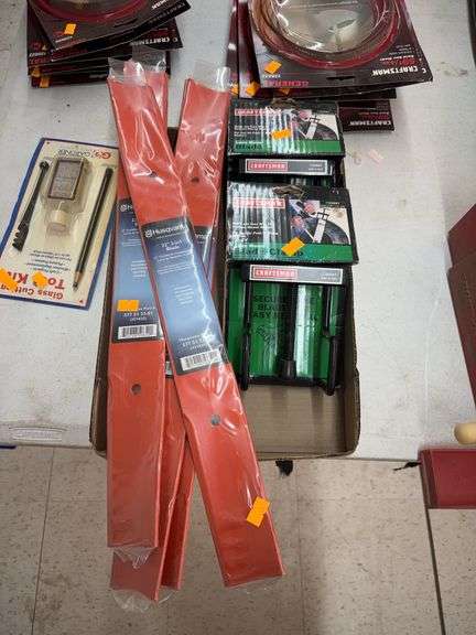 Flat of  ower blade clams and mower blades image