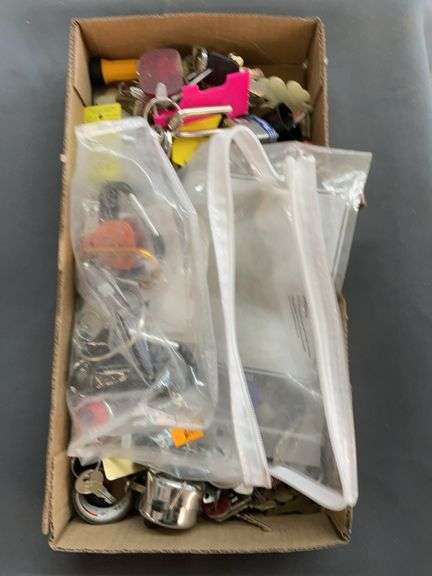 Box of keys, padlocks, and keychains image