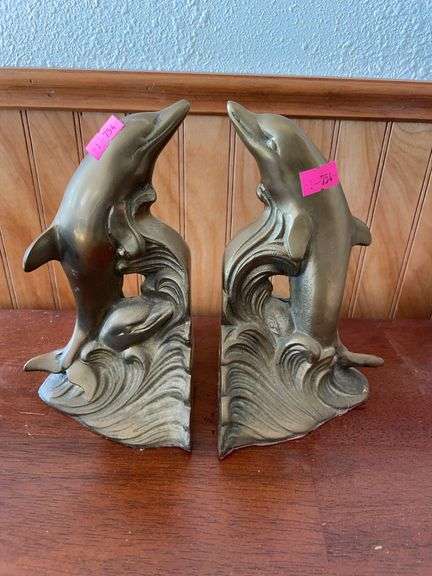 Set of brass dolphin book ends ￼ image