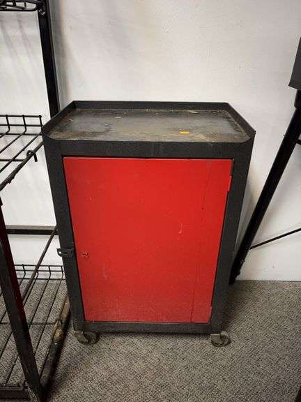 Small metal cabinet on wheels image