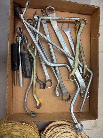 Flat of combination wrenches and various tools image