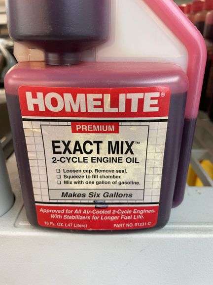 Nine bottles of home light premium exact mix two cycle engine oil. image