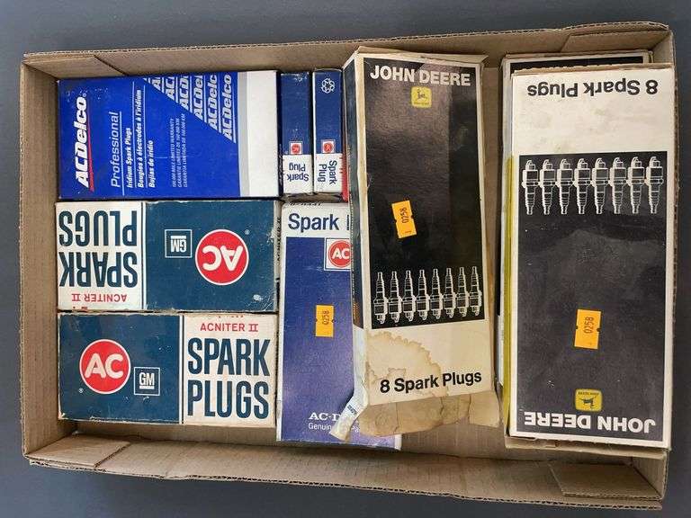 Flat of full and partial cases of spark plugs image