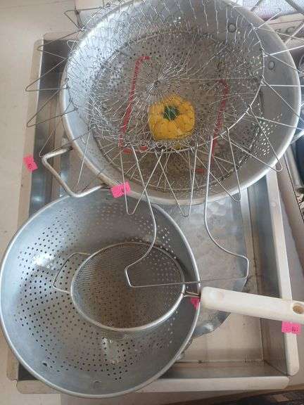Flat with metal strainer/ tray. image