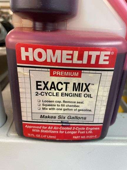 Nine bottles of home light premium exact mix two cycle engine oil. image