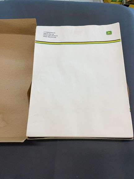 Box of Vintage John Deere stationary. image