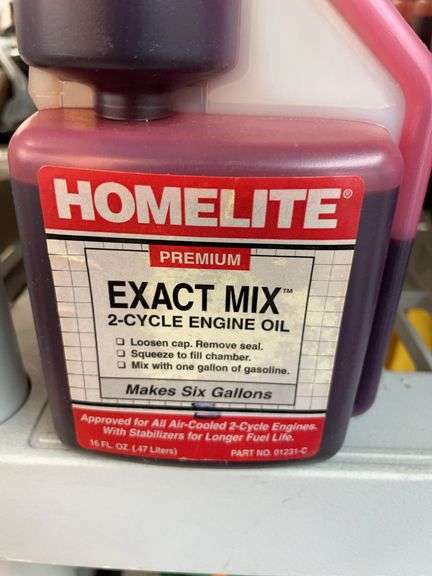 Nine bottles of home light premium exact mix two cycle engine oil. image