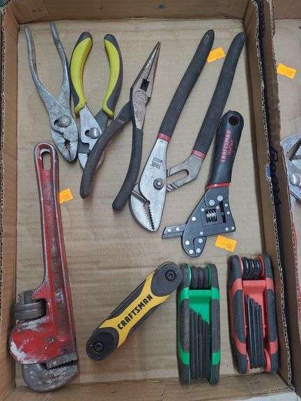 3 sets of craftsman allen wrenches,  1 pipe wrench , 4 pairs of pliers,  1 needle nose pliers image