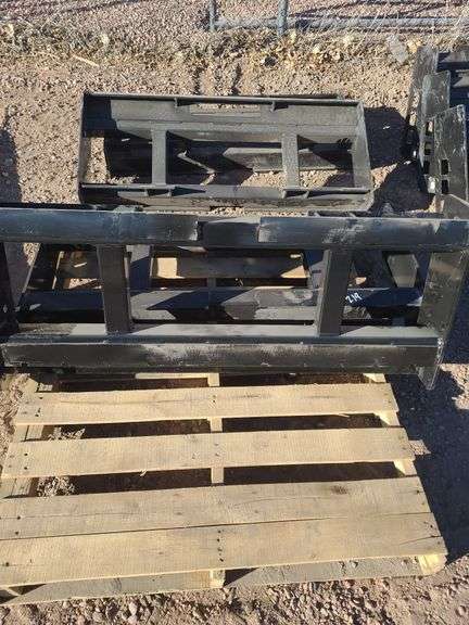 One New 2025 wolverine powerfull attachment skid steer fork backing plate. Model PFF21345W. image