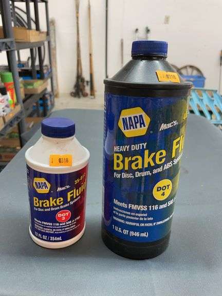 Two bottles of Napa brake fluid image