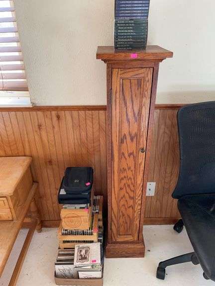 Lot of several CDs and CD cabinet image