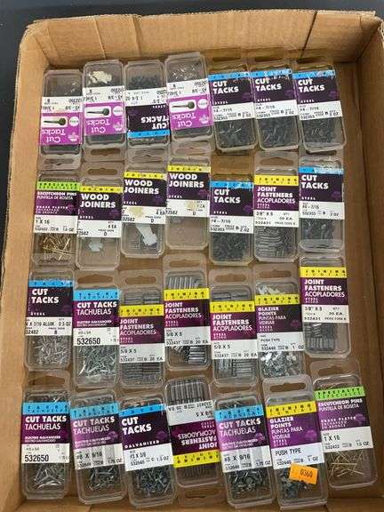 28 Small boxes of nails and fasteners. image
