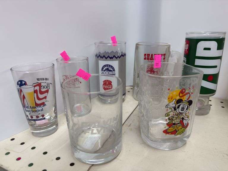 Assorted memorabilia, glasses, Shakey‘s pizza, 7-Up, Rockies, Disneyland image