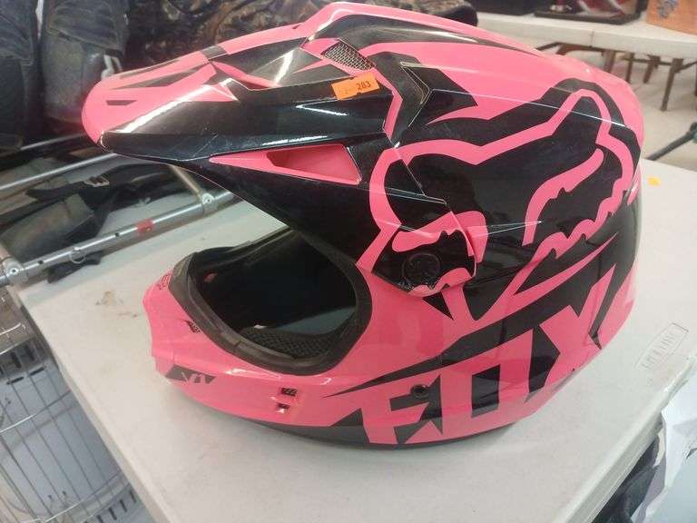 Fox pink dirtbike helmet medium image