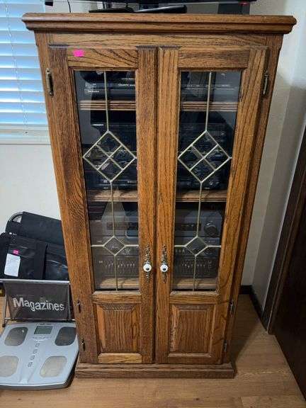 Wood cabinet and stereo system image