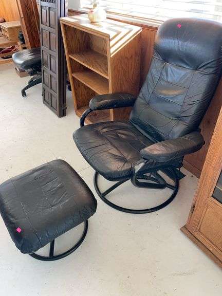 Leather chair with ottoman. image