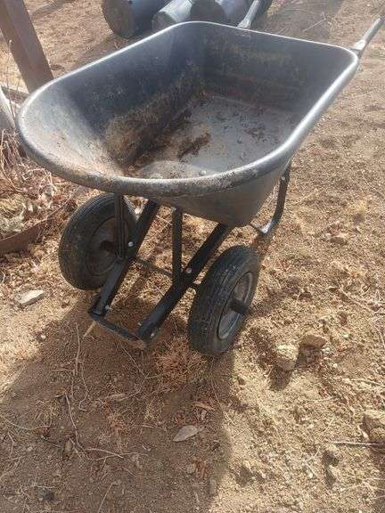 Heavy-duty black ace wheelbarrow. image
