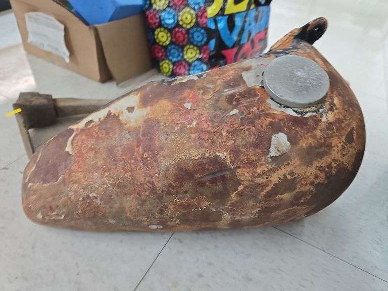 Vintage motorcycle tank, hoe. image