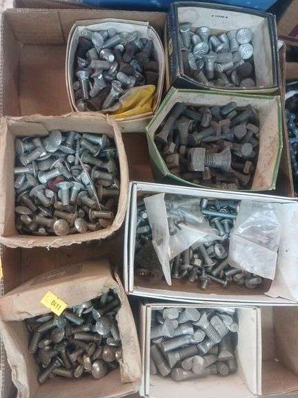 4 flats of misc sized grade 5 bolts, washers and  nuts. image