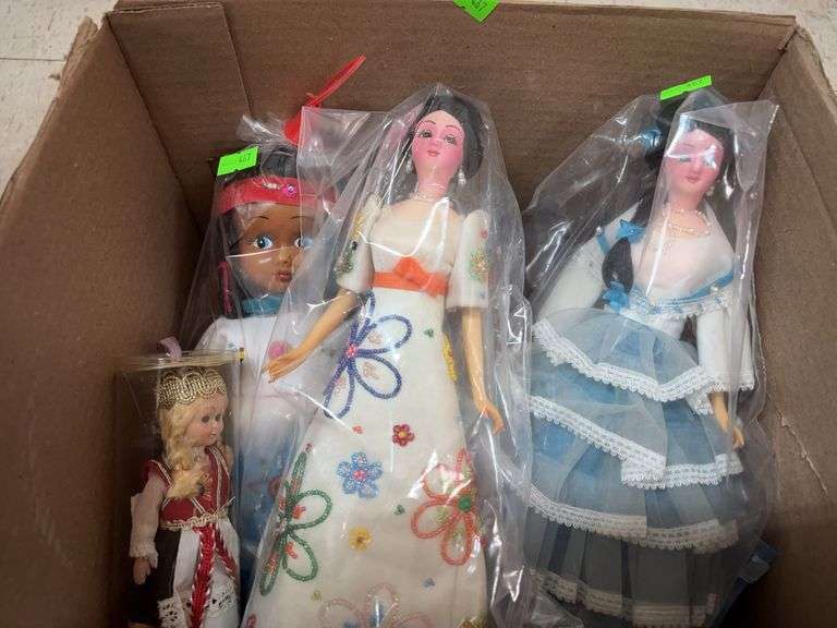 Box of dolls image