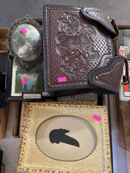 Vintage pictures with frames and a leather purse image