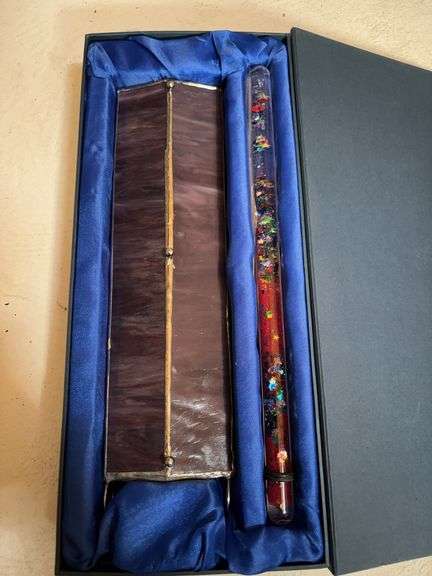 stained glass kaleidoscope with a prismatic oil wand image