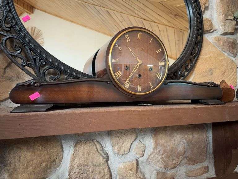 mid-century modern walnut mantle clock with a gold-tone brass bezel and Roman numerals image