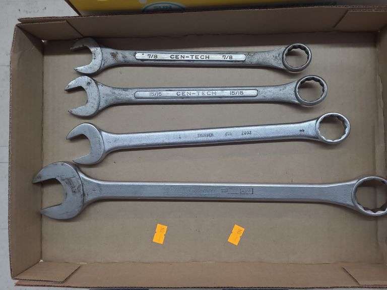 4  wrenches  sized 7/8, 15/16, 1inch, 1 1/4. image