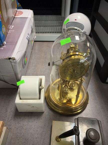 Ideal Moistener, brass clock image