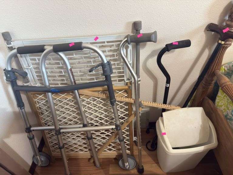 Walker, canes, baby gates, small trash can image