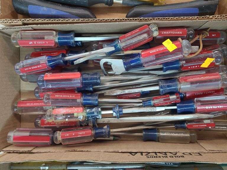 box of various sized and length craftsman screwdrivers image