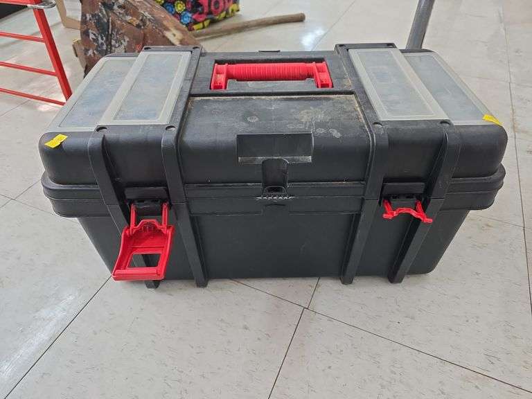 Toolbox with misc contents. image