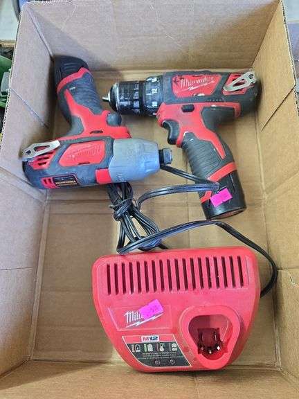 2 Milwaukee Drils w/ 2 Batteries and Charger image