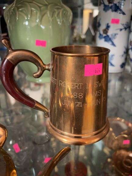 Brass mug and gold glass turtle image