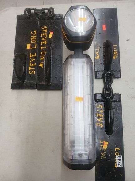 Hanging light/radio and 2 metal plates. image