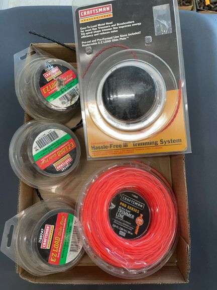 Box of trimmer line, easy load glide plates, and a craftsman easy load metal head image