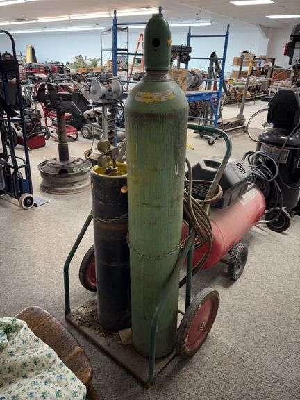 portable oxygen-acetylene torch set with cylinders and a cart image