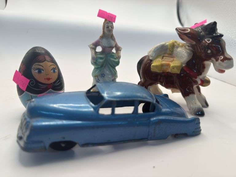 Porcelain figurines, a Russian egg and I can’t steal your car missing one wheel structo brand image