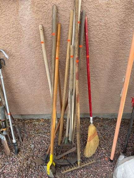 Collection of yard tools Rakes,shoes image