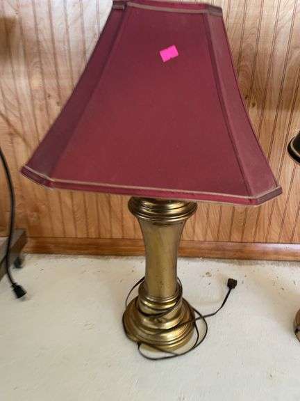 Brass lamp with burgundy shade image