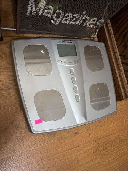 Weight scale, stadium stand seat, magazine holder image